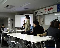 報告会での発言の様子